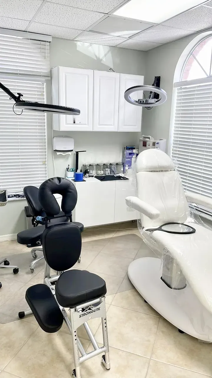 Inside the Derma Follic SMP studio in San Francisco — treatment chair, ring lights and sanitized workstation